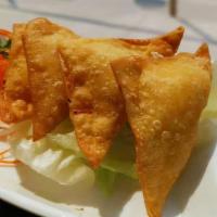 Crab Rangoon(4Pcs) · Served with mango chili sauce