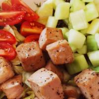 Seared Tuna Salad · Lettuce, spring mix, cherry tomato, cucumber and seared tuna with orange yuzu sauce.