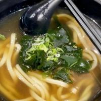 Wakamen Udon · Pork broth, topped with fresh seaweed and scallions.