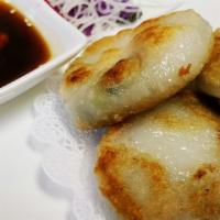 Chive Dumplings (3 Pc) · Rice flour dumplings filled with fresh chives served with sweet chili sauce.