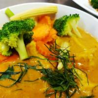Panang Curry · Vegetarian available. Spicy. Your choice of meat or tofu cooked in coconut milk, panang curr...