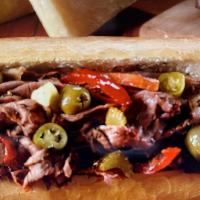 Italian Beef Sandwich · Thinly sliced premium seasoned roast beef, simmered and dipped in au jus on a French roll.