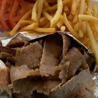 Gyros Plate · Best gyros slowly cooked on a spit with extra meat served with tzatziki sauce, onion, tomato...