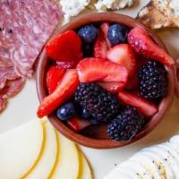 Breakfast Board · Artesian Loaf, Specialty Cheeses, Cured Meats, Hard Boiled Egg, Fresh Fruit and Jam.