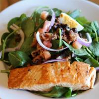 The Salmon And Spinach Salad · Fresh baby spinach, seared salmon, smoked bacon, hard boiled egg, wood fired roasted mushroo...