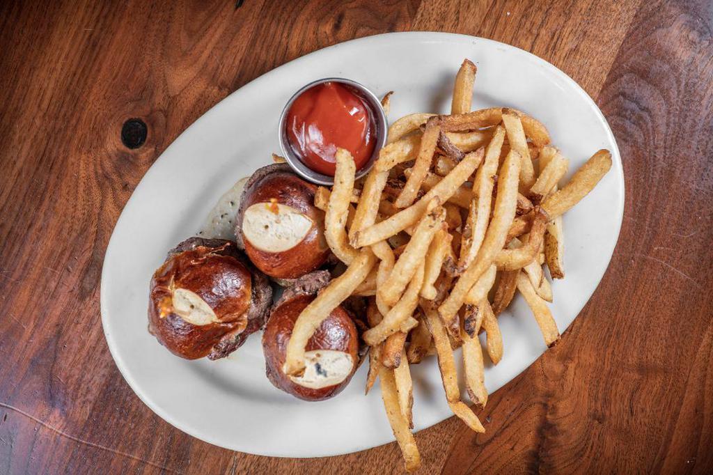 Labriola Filet Sliders On Mini Pretzel Bun · A trio of prime beef filets grilled to order, topped with maître d'butter, and served with hand cut fries