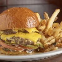 All American Double Cheese Burger · Two hand-formed patties with American cheese, lettuce, tomato, onion, pickle and house-made ...