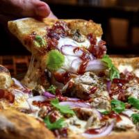 Califronia Chicken Pizza · Barbeque sauce, grilled chicken, bacon, smoked gouda, red onion, and cilantro