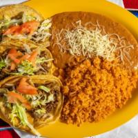 Taco Dinner · Three tacos, your choice of ground beef, chicken o steak. Served with rice and beans.