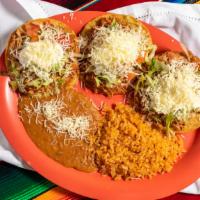 Tostada Dinner · Three tostadas with your choice of steak, ground beef, chicken o avocado. Served with rice, ...