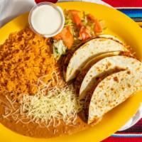Quesadillas A La Plancha Dinner · Three folded corn o flour tortillas filled with monterey cheese. Your choice of chicken, ste...