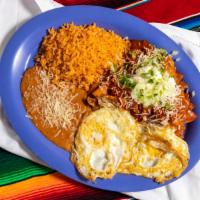 Chilaquiles Con Huevo · 2 Sunny side up eggs with either red salsa, or green salsa Chilaquiles. topped off with sour...