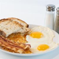 Big Bite Breakfast · Two eggs, choice of bacon, sausage or ham, choice of side and toast.