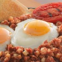 Homemade Corned Beef Hash · Homemade corned beef hash a secret family recipe! Served with two eggs and toast.