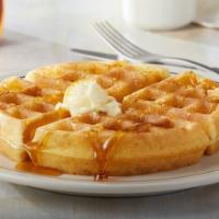 Belgian Waffle · Our crispy Belgian Waffle topped with butter and powdered sugar.