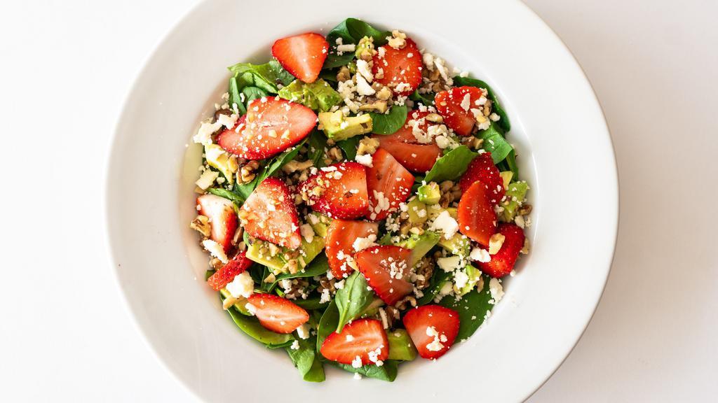 Berry Avocado Salad · Fresh greens with extra spinach, strawberries, avocado, feta and candied walnuts, add grilled chicken for additional price.