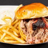 Pulled Pork Sandwich · Includes fries.