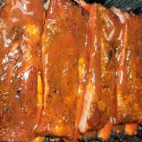 Bbq Ribs Half  Slab  · St Louis style. Seasoned with house rub and slow smoked.
Sides not included