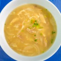 Dakgomtang (Chicken Soup) · Whole chicken boiled then strips of chicken is used in its own broth to make this soup so go...