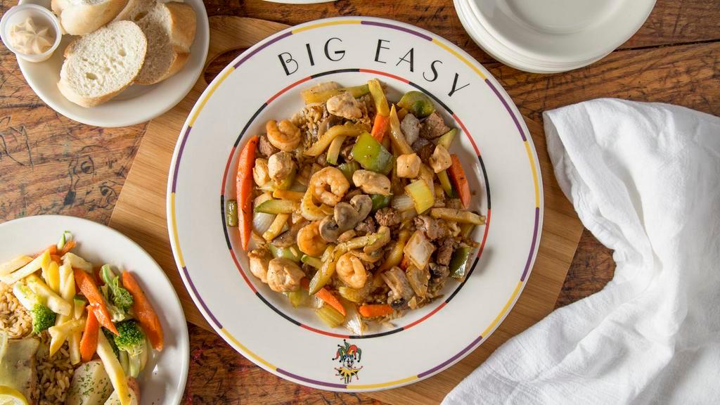 Cajun Stir Fry · Your choice of beef, chicken, shrimp, or a combination of all three, sautéed with vegetables and Cajun spices, served over dirty rice.