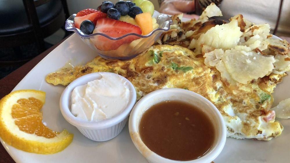 California Omelette · Three eggs with avocado, bacon, tomato, and pepper jack cheese. Served with salsa and sour cream.