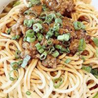 Dan Dan Noodle / 担担面 · Spicy. a classic sichuan street food wheat noodles topped with ground pork and chopped scall...