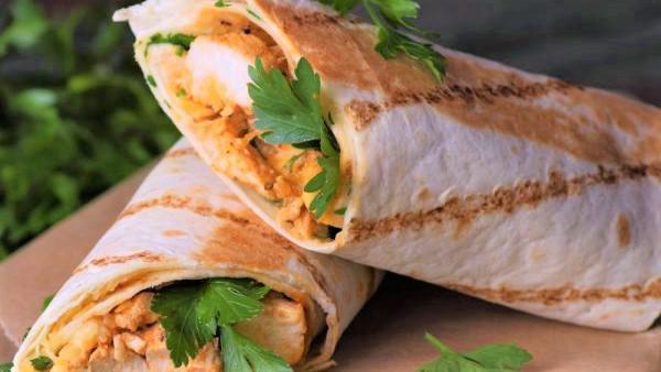 Chicken Wrap · Chicken cooked with onion and green pepper rolled in naan paper.