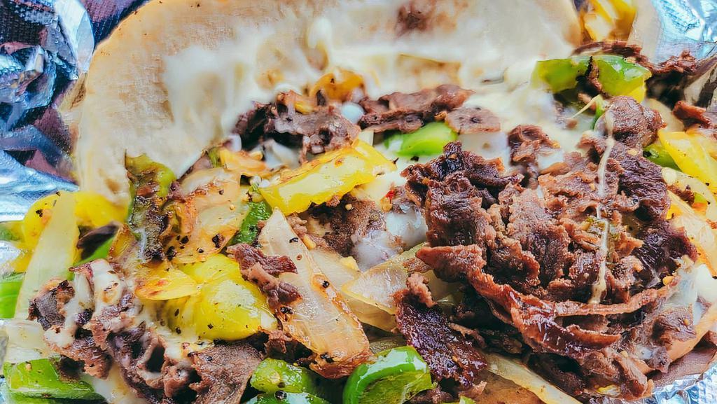 Steak Philly · Topping choices:
Onion, green peppers, mushrooms, mozzarella cheese and mayonnaise sauce.