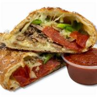 Skinny V · Our Vegan Calzone. HAPPY LITTLE PLANTS® Pepperoni / HAPPY LITTLE PLANTS® Sausage Meatballs /...
