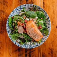 Salmon Fattoush Salad · Atlantic Salmon, baby spinach, arugula, . crispy seasoned pita bread, diced tomatoes, . radi...