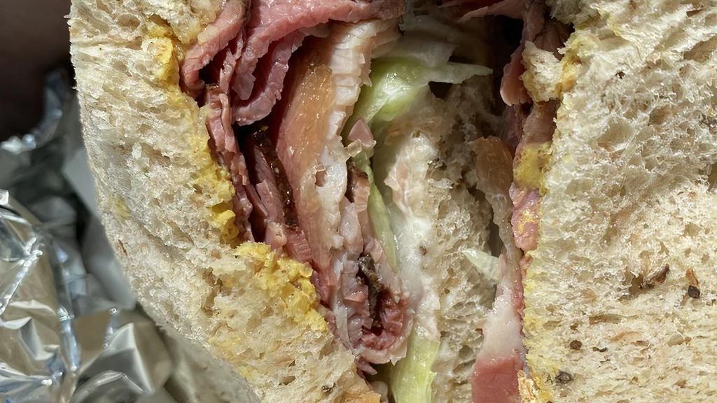 Maccabee Sandwich · Kosher - pork free; no cheese and meat together. Served with 1/2 lb. of meat, famous corned beef and roast beef, piping hot. Our favorite sandwich. Roast beef and corned beef on rye bread. Extra charge applicable for challah or focaccia