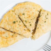 Quesadillas · Crispy golden 12” flour tortilla and your choice of fajita beef, fajita chicken, or shrimp. ...