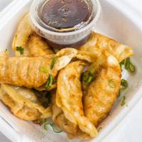 Gyoza · Steamed or fried. Served six pieces.