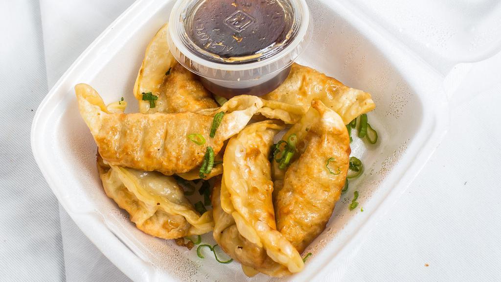 Gyoza · Steamed or fried. Served six pieces.