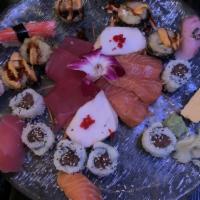 Shogun Set · 8 pieces chef's choice sashimi, 6 pieces nigiri, 1 spicy tuna roll, 1 jb roll and spider.