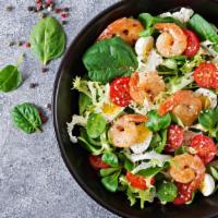 House Shrimp Salad · Romaine lettuce tossed with tomatoes, and cucumber. Topped with a Hearty Helping of Shrimp.