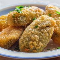 Jalapeño Poppers · Six hot and inviting Jalapeño Poppers.