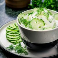 Yogurt Salad · Diced cucumbers mixed with Greek yogurt.