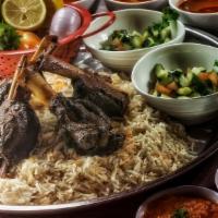 Mandi Lamb · Our most papular lamb dish, oven cooked served with basmati rice.