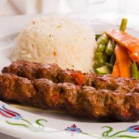 Beef Kofta Kabab · One grilled skewer of savory beef kofta kabab marinated with delicious spices served with ba...