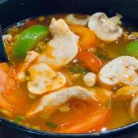 Tom Yum Soup · Thai version of hot & sour soup with chicken breast, white mushrooms, tomatoes, lemon grass,...