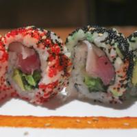 Harajuku (10) · Jumbo Roll: Yellow tail, seared albacore, jalapeño, avocado, cilantro with orange and black ...