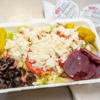Greek Salad · Lettuce Tomatoes cucumber onion green pepper black olives beets pepperoni's and feta cheese.