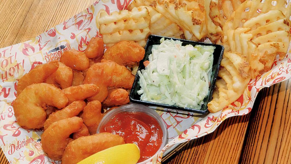 Beer Battered Shrimp · Beer battered shrimp served with fries, coleslaw, and cocktail sauce