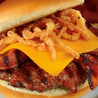 The Charcoal Burger · A house favorite! Topped with BBQ sauce, bacon strips, cheddar cheese and onion strings.

Th...