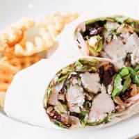 Wisconsin Harvest Wrap · Chopped fresh greens, dried cranberries, apples, red onions, toasted walnuts and Bleu cheese...