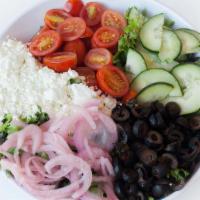 Greek Salad · Mixed greens, grape tomatoes, cucumbers, pickled onions, black olives, feta cheese, and Gree...