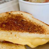 Grilled Cheese & Soup · gouda & cheddar on lucky cat white bread choice of soup.