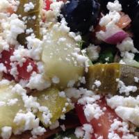 Fattoush Salad  · Romaine & lettuce mix, tomato mix, black olives,
pickles, onions, toasted pita chips & red o...