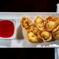 Cream Cheese Puffs (6Pc) · Fried cream cheese wonton with sweet and sour sauce.